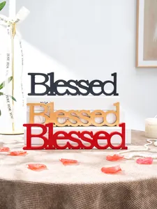 Decorative Blessed wooden letter signs in black, gold, and red for romantic wedding decor