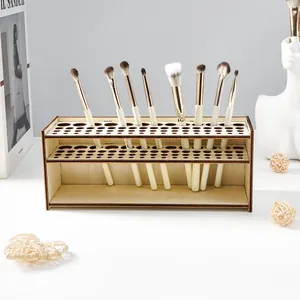 Detail of minimalist wooden makeup brush organizer with multi-slot design