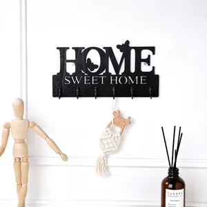 Kreative schwarze Wandhaken aus Holz HOME SWEET HOME für den Flur und Wohnbereich