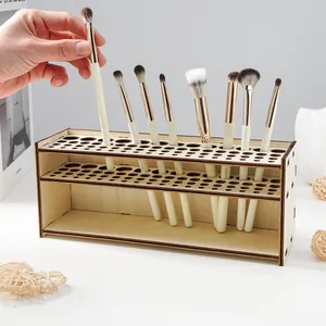 Detailed view of wooden makeup brush holder with various slot sizes for easy storage