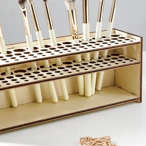 Detail of minimalist wooden makeup brush organizer with multi-hole storage structure.