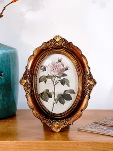Ornate European vintage bronze resin photo frame with intricate carved floral patterns
