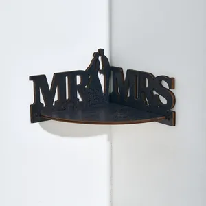 Wooden wedding corner shelf with MR and MRS text for home decor and romantic room wall display.