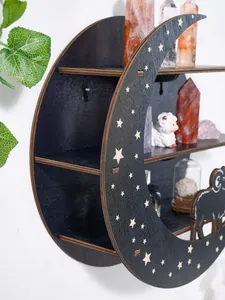 Macro view of black crescent moon wooden wall shelf with white stars and sheep design