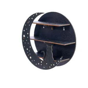 Modern black wooden circular wall shelf featuring crescent moon and cat silhouette decor