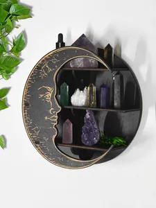 Detailed view of a mystical 3-tier wooden moon shelf displaying crystals on a white wall