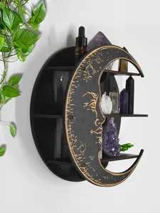 Close-up detail of a crescent moon wooden shelf with engraved face showing its three tiers