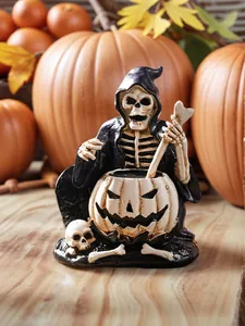 Detailed view of a resin Halloween skeleton wizard figurine stirring a pumpkin pot.