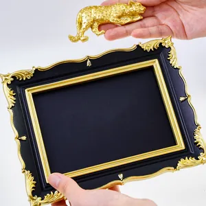 Vintage black and gold baroque photo frame with DIY leopard ornament for wall decor