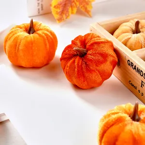 Macro view of soft plush pumpkin decorations for festive autumn home decor