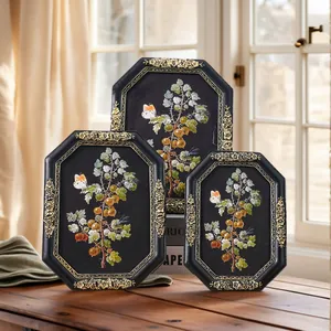 Vintage European octagonal picture frames with golden floral and botanical designs