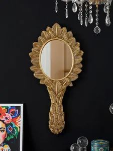 French vintage golden resin oval wall mirror with ornate leaf carved frame detail