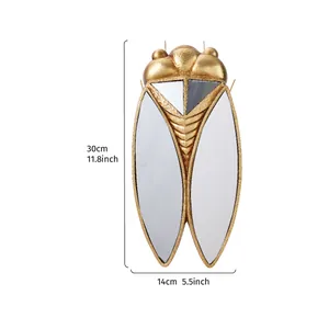 Espejo de pared decorativo dorado con forma de cigarra y marco de resina de 30x14cm