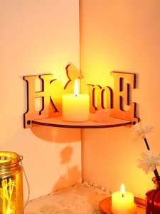 Detailed view of a cozy wooden HOME bird corner shelf with a glowing warm candle light