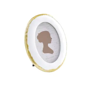 Élégant cadre photo ovale blanc et doré pour une décoration de bureau 10x15cm