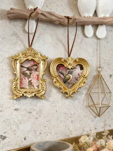 Mini cornici dorate appese in stile vintage con motivi di uccelli e fiori decorativi