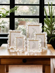 Juego de marcos de fotos decorativos de resina con borde dorado y margaritas en 3D