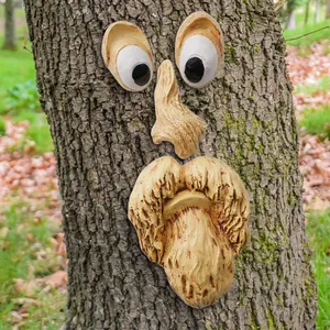 Funny resin tree face decoration with eyes nose and beard for garden tree trunks.