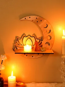 Decorative macro view of the wooden lotus moon shelf featuring lit candles and crystals