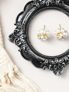 Detail view of vintage ornate black and silver resin frame with intricate relief carvings