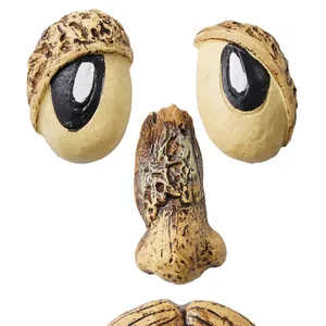 Detailed view of 4-piece resin tree face decoration with realistic bark texture for gardens