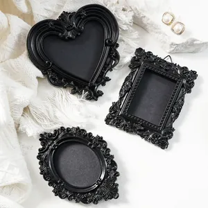 Vintage black mini magnetic photo frame set featuring heart, oval, and rectangular designs