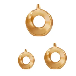Set di tre moderni vasi a ciambella dorati minimalisti in resina con design a anello