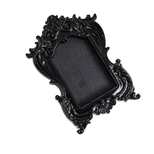 Ornate vintage black mini magnetic photo frame for creative photography and DIY home decor