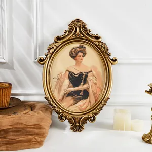 Elegant French vintage gold carved oval photo frame featuring a noblewoman portrait painting