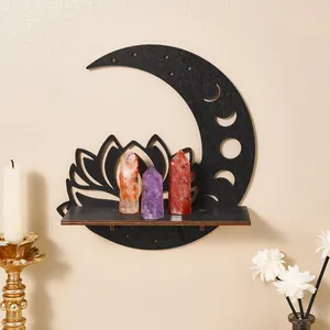 Bohemian black wooden moon and lotus wall shelf with healing crystal stones