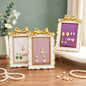 French gilded bow jewelry display stand set with multi-color velvet lining