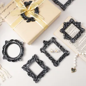 Vintage European resin frames set in black silver with embossed carving ornaments