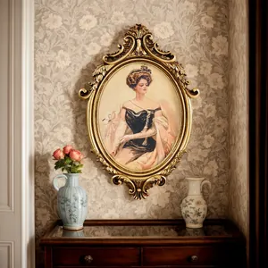 Vintage French golden carved oval frame with portrait art hanging on a floral wall