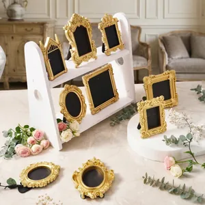 Set of vintage golden relief photo frames for elegant desktop decoration and photography