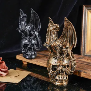 Close-up of vintage bronze and black dragon skull ornaments for Halloween decor.