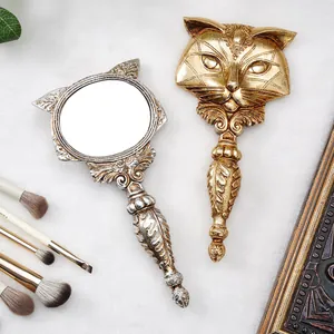 Ornate vintage resin fox head handheld vanity mirrors in gold and silver finishes