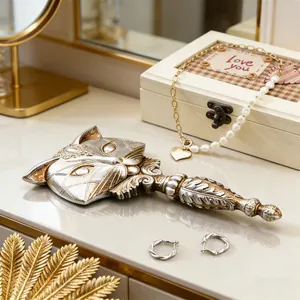 Vintage resin fox-shaped handheld vanity mirror with antique gold and silver finish