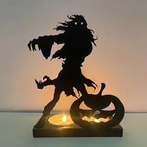 Spooky Halloween silhouette iron candle holder with zombie and carved pumpkin design