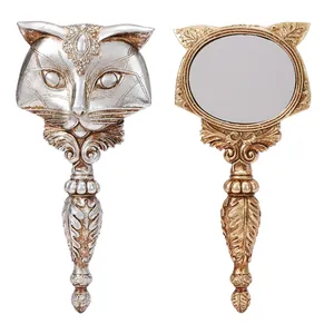 Ornate vintage resin fox head handheld makeup mirrors in gold and silver metallic finishes