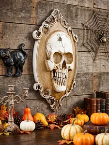 Vintage skull wall relief in ornate frame presented in a festive Halloween scene