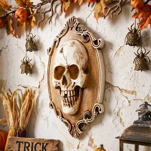 Vintage 3D skull relief wall decor with ornate frame for dark Halloween party scenes