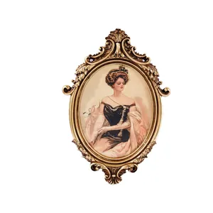 Vintage gold carved oval photo frame featuring an elegant Victorian lady portrait artwork