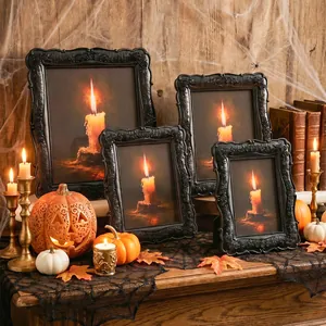 Marcos de fotos negros de Halloween con arte de velas y decoración de calabazas