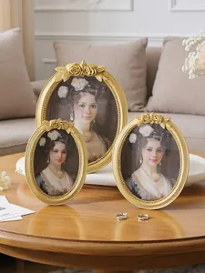Ornate European vintage golden resin photo frame set featuring delicate rose carving details