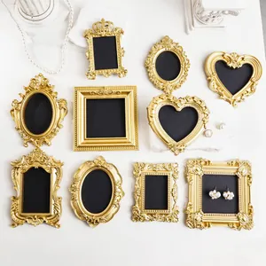 Vintage golden embossed mini photo frames collection for elegant jewelry and photo display