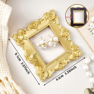 Detailed view of a gold ornate 3-inch magnetic photo frame for fridge or desktop