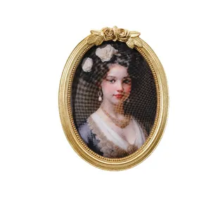Vintage European style golden oval resin photo frame featuring a classic portrait design