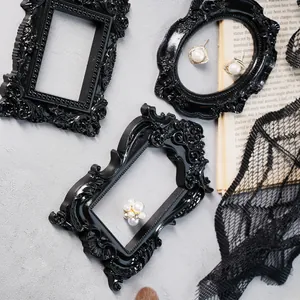 Set of three retro black Baroque mini photo frames for gothic Halloween photography props