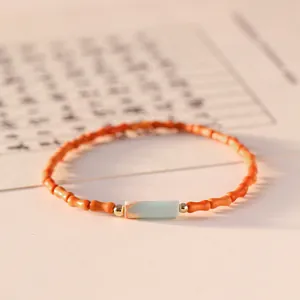 Elegant olive pit bamboo bead bracelet with light blue Shoushan stone centerpiece