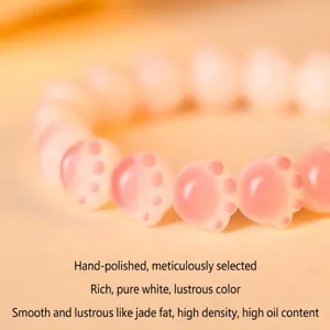 Elegant Sakura pink cat paw Bodhi seed bracelet with a smooth and jade-like texture